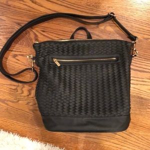 Black convertible tote bag to backpack